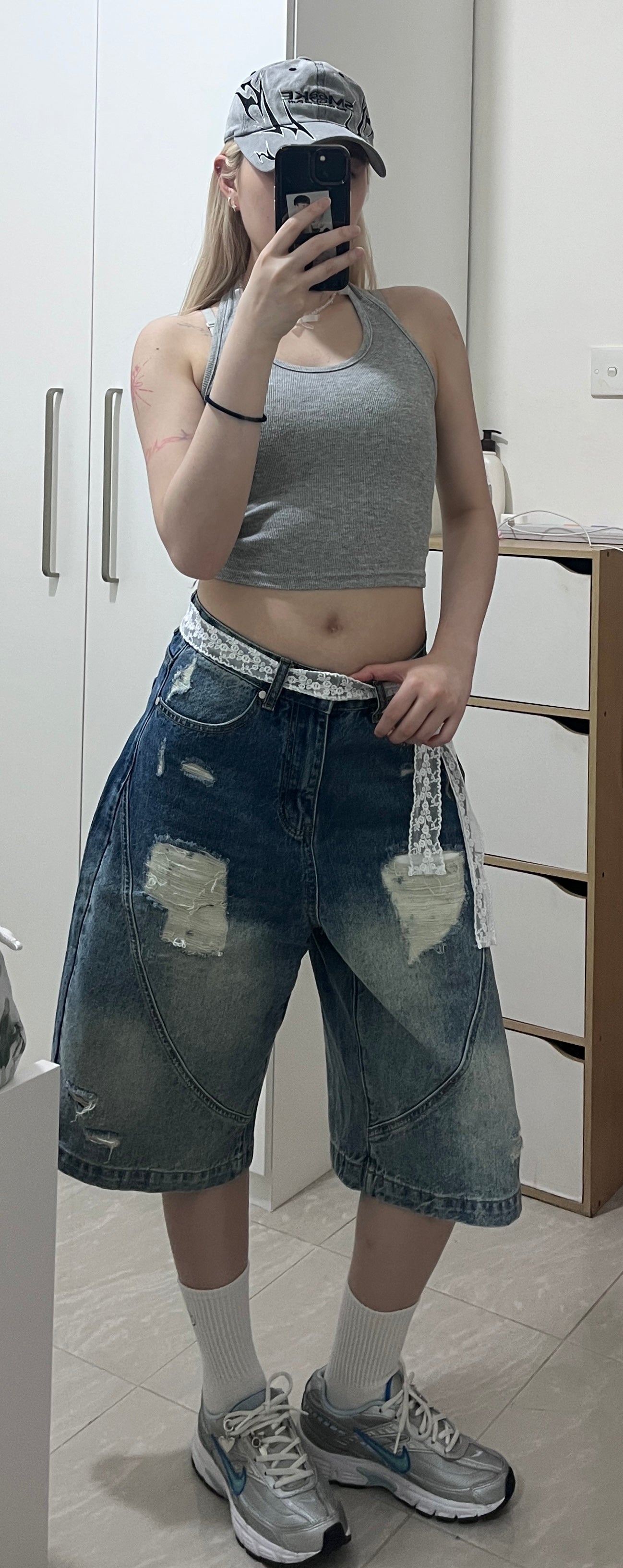 blue ripped 6-inch denim shorts