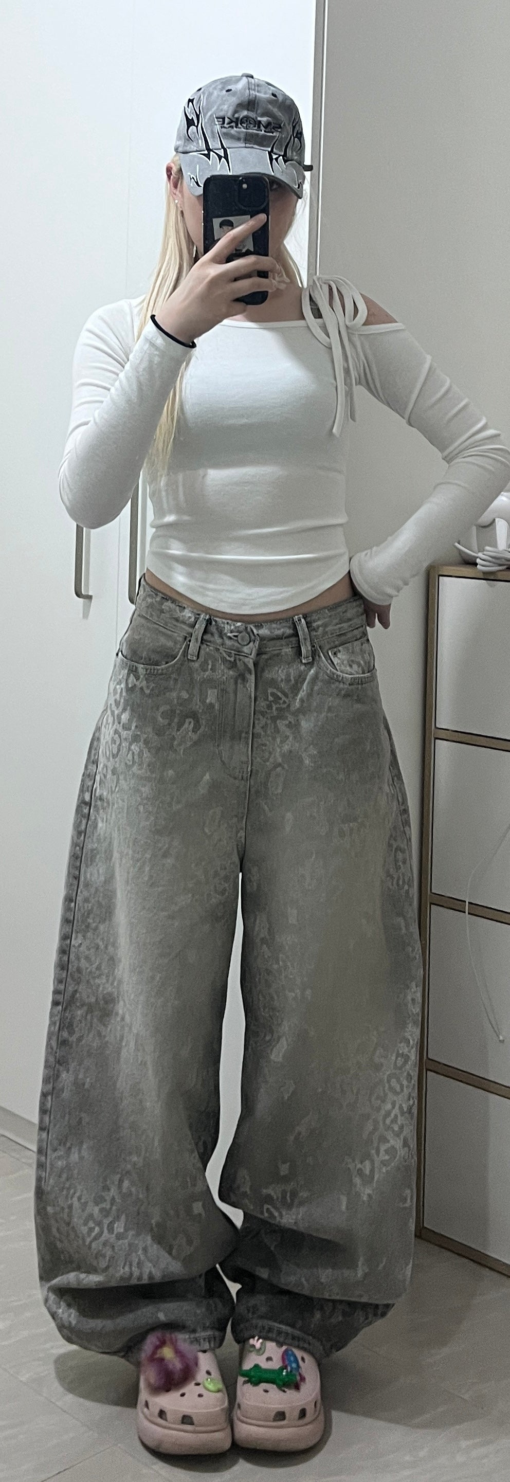 Faded leopard print baggy jeans