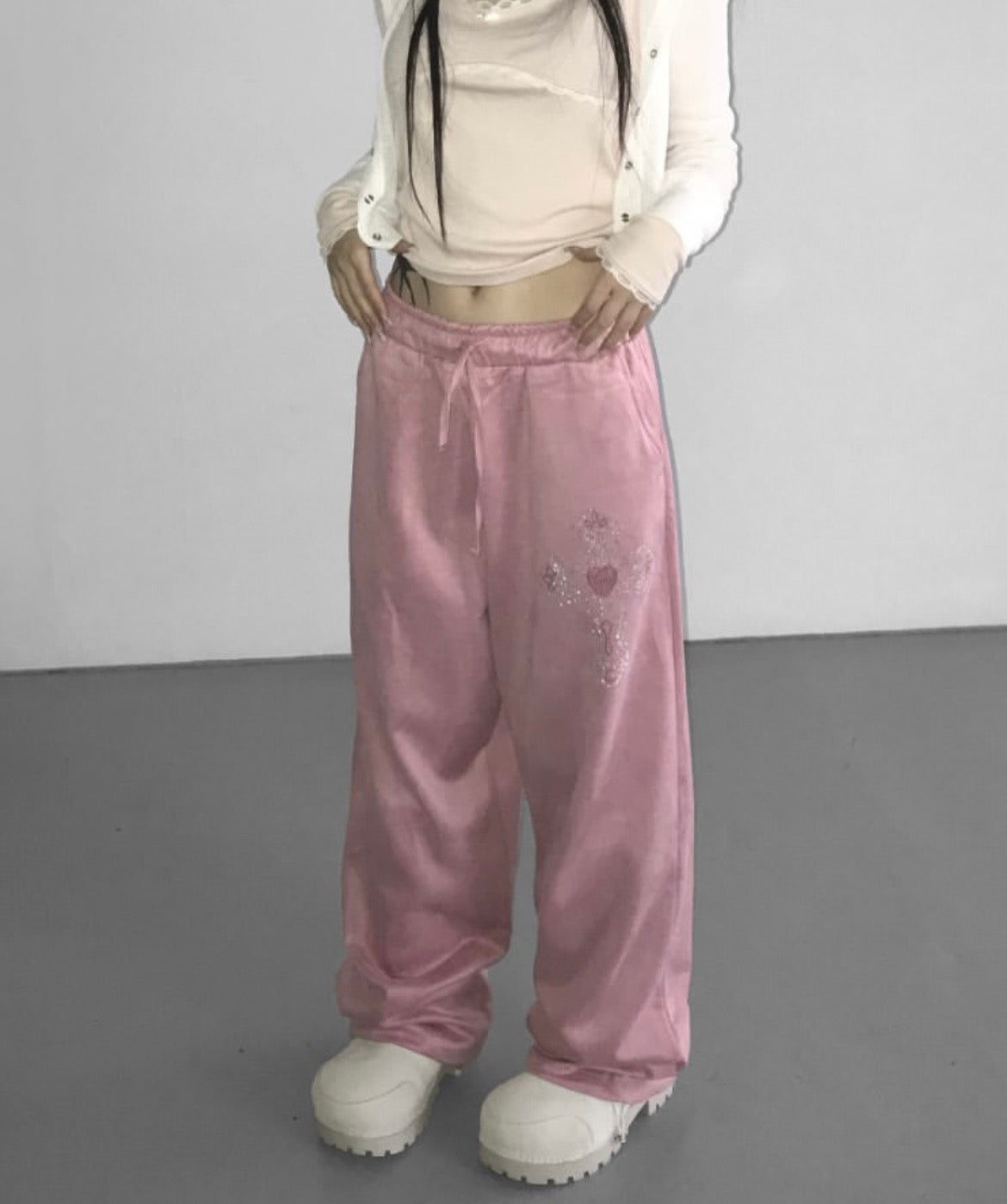 Cross charm suede-effect drawstring pants