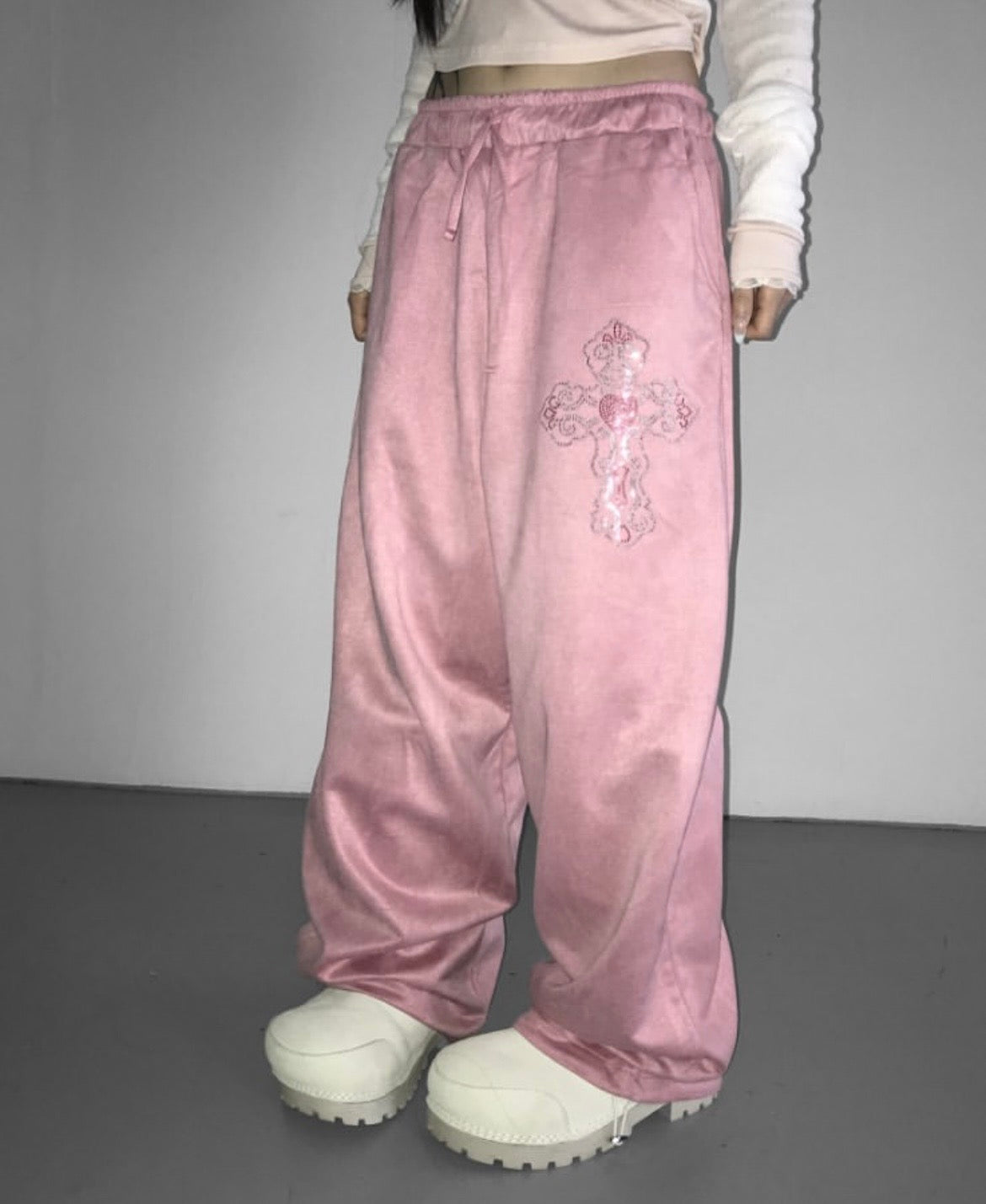 Cross charm suede-effect drawstring pants