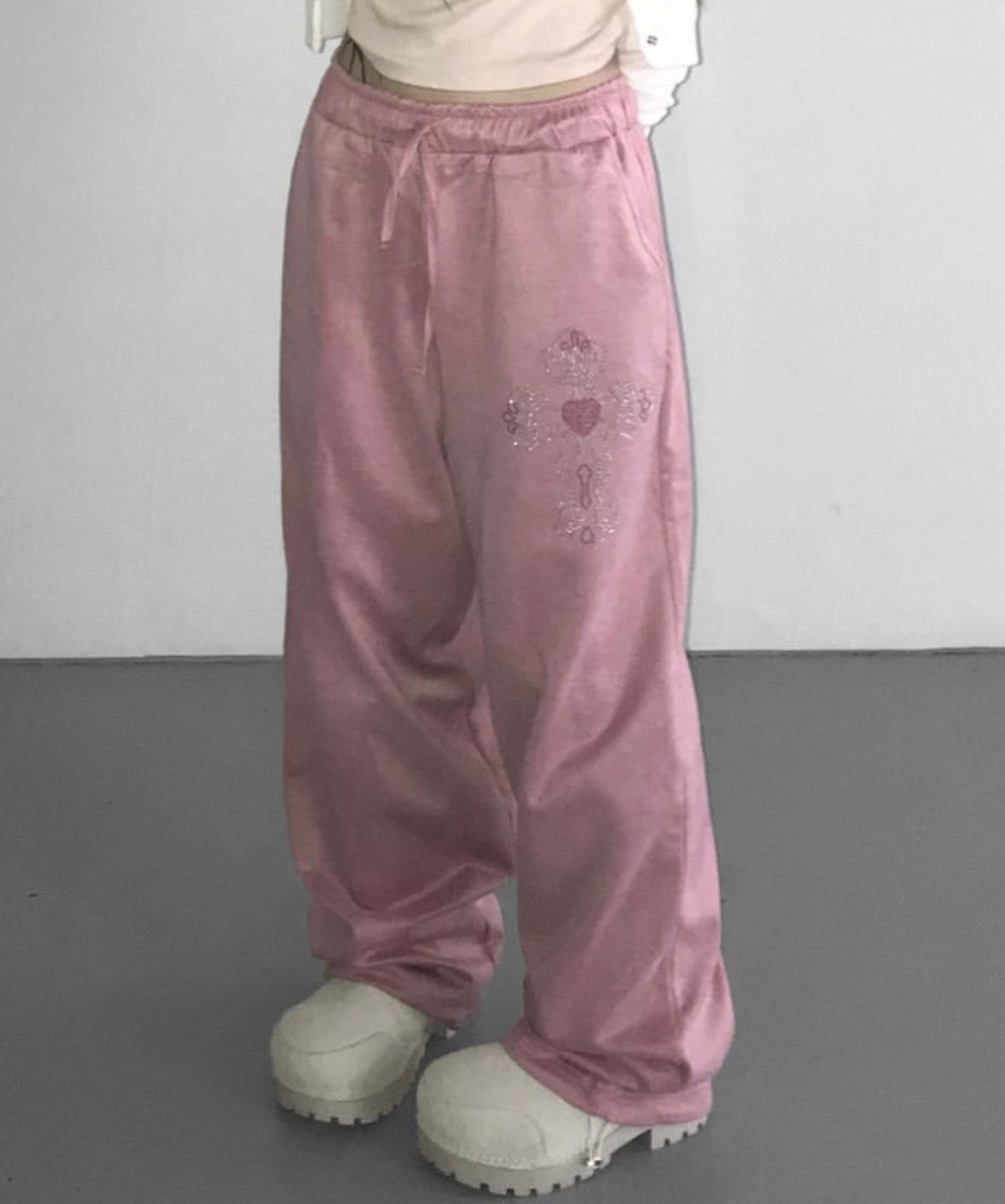 Cross charm suede-effect drawstring pants