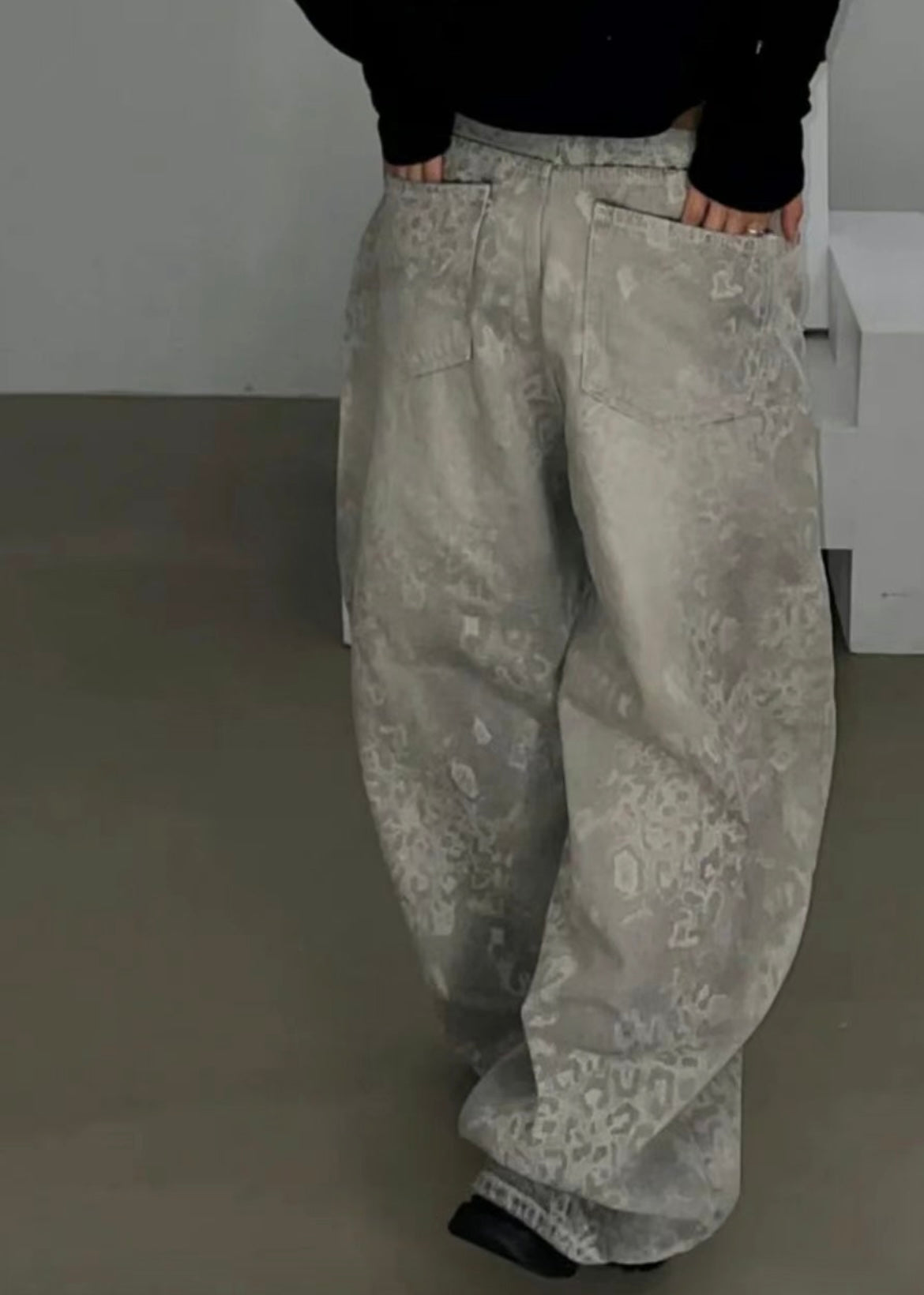Faded leopard print baggy jeans