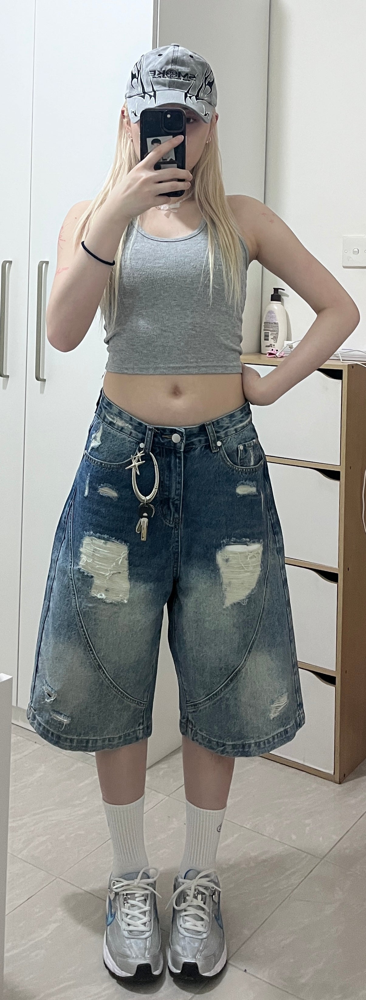 blue ripped 6-inch denim shorts